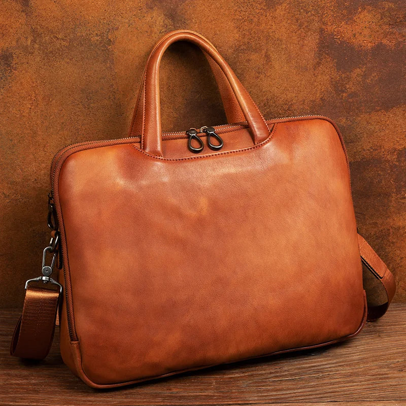 Luxury handcrafted vegetable-tanned leather briefcase for men, perfect for business and laptop use, with a vintage design and st