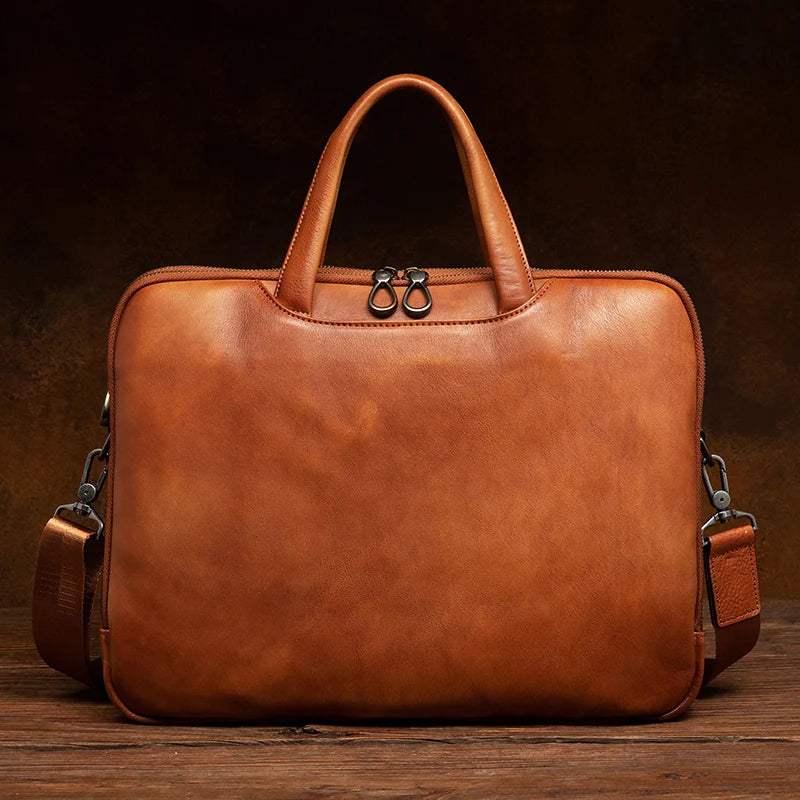 Luxury handcrafted vegetable-tanned leather briefcase for men, perfect for business and laptop use, with a vintage design and st