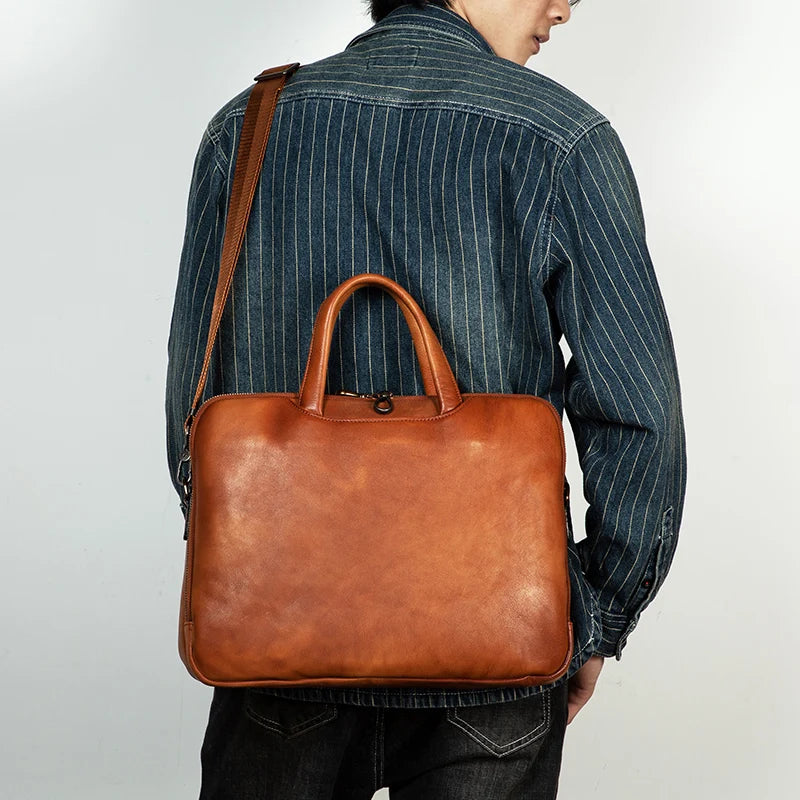 Luxury handcrafted vegetable-tanned leather briefcase for men, perfect for business and laptop use, with a vintage design and st