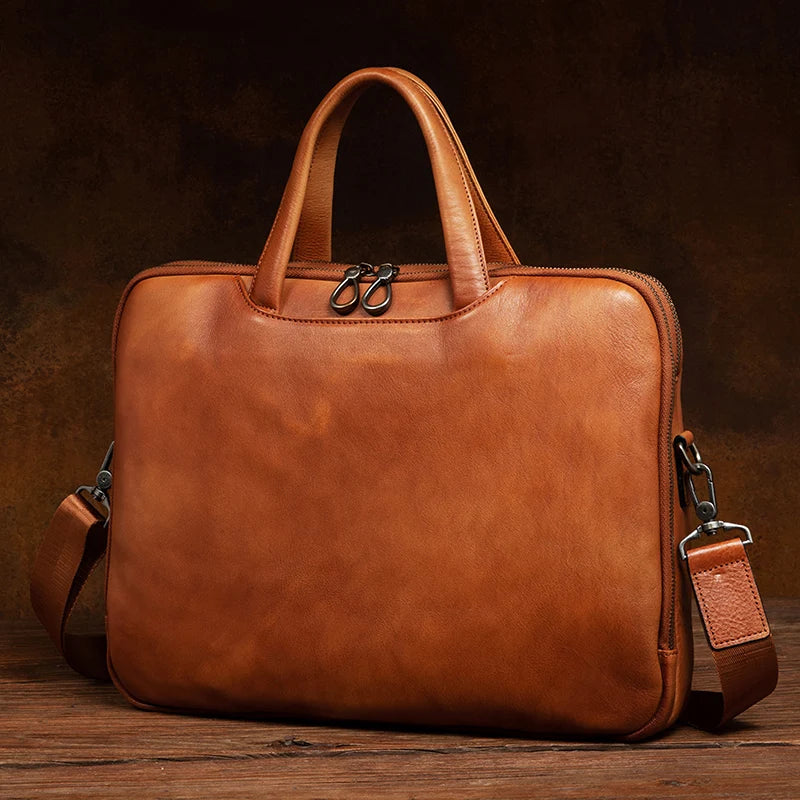 Luxury handcrafted vegetable-tanned leather briefcase for men, perfect for business and laptop use, with a vintage design and st